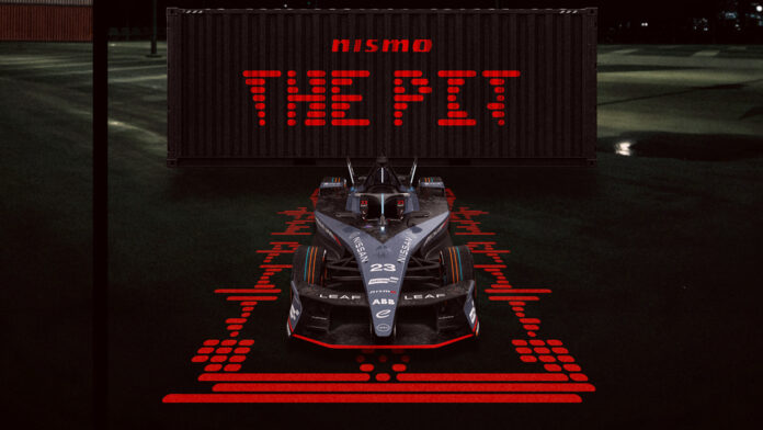 Landscape front on image of the #23 Nissan e-4ORCE 05 with the unique one-off NISMO livery on the car, with 'The NISMO Pit' branding behind.